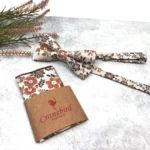 Rusty Burnt Orange and Brown Floral Bow Tie on Off White Background
