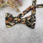 Burnt Orange and Olive Brown Floral Bow Tie on Deep Forest Green Background - Image 3