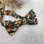 Burnt Orange and Olive Brown Floral Bow Tie on Deep Forest Green Background - Image 2